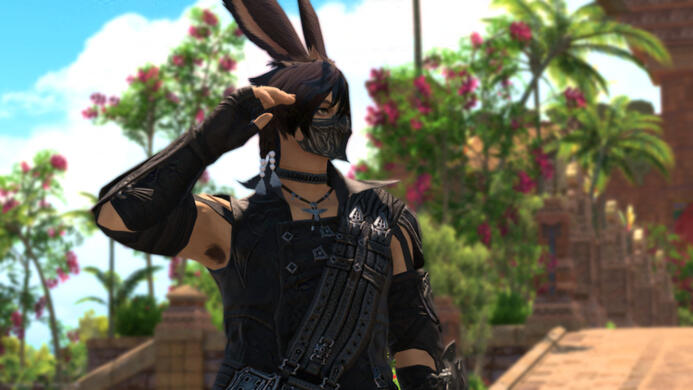 Cinnamon, a Viera with dark brown hair and tan skin, looking off to the right amongst vibrant foliage, wearing their Reaper attire.